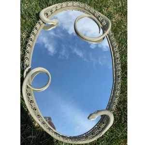 Modern snake mirror with a vintage look